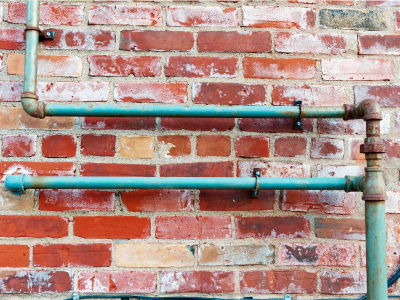 Replacing old pipes to improve plumbing efficiency and prevent leaks.